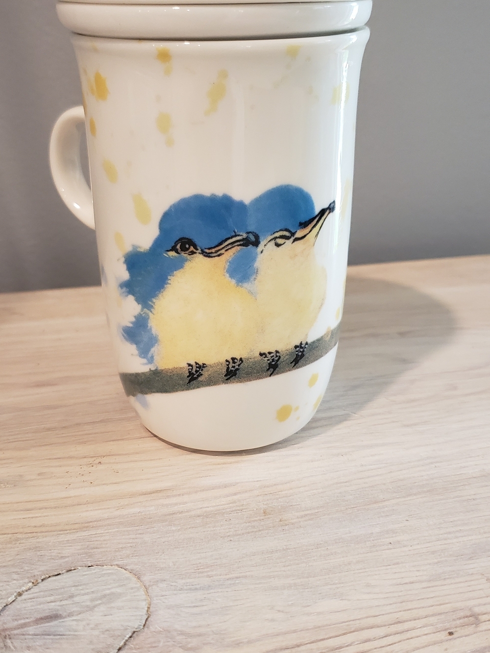 Whimsical White Ceramic Tea Infuser with Blue & Yellow Bird Motif - Picture 2 of 5